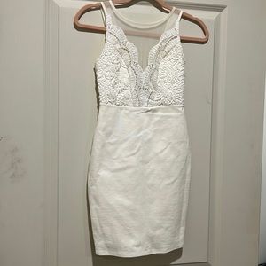 Lulus white crotchet and lace bodycon  dress. Perfect for sorority rushing